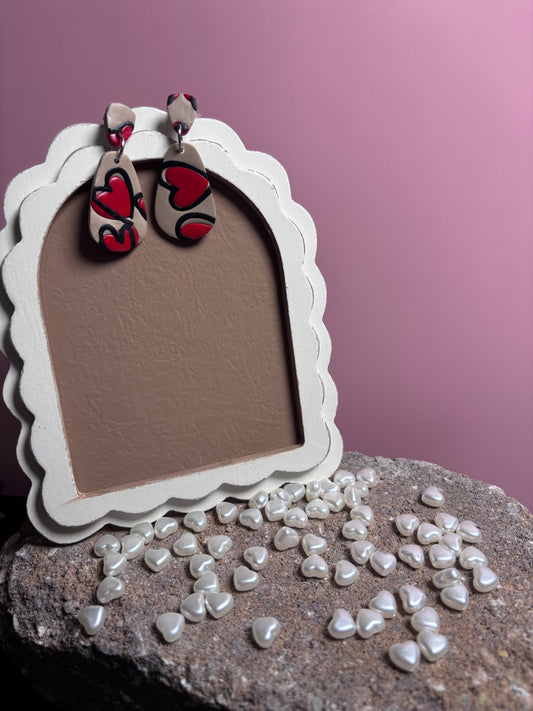 Long tear drop abstract hearts